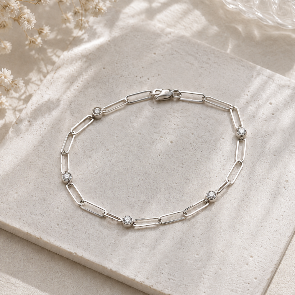 Clip y diamantes oro blanco