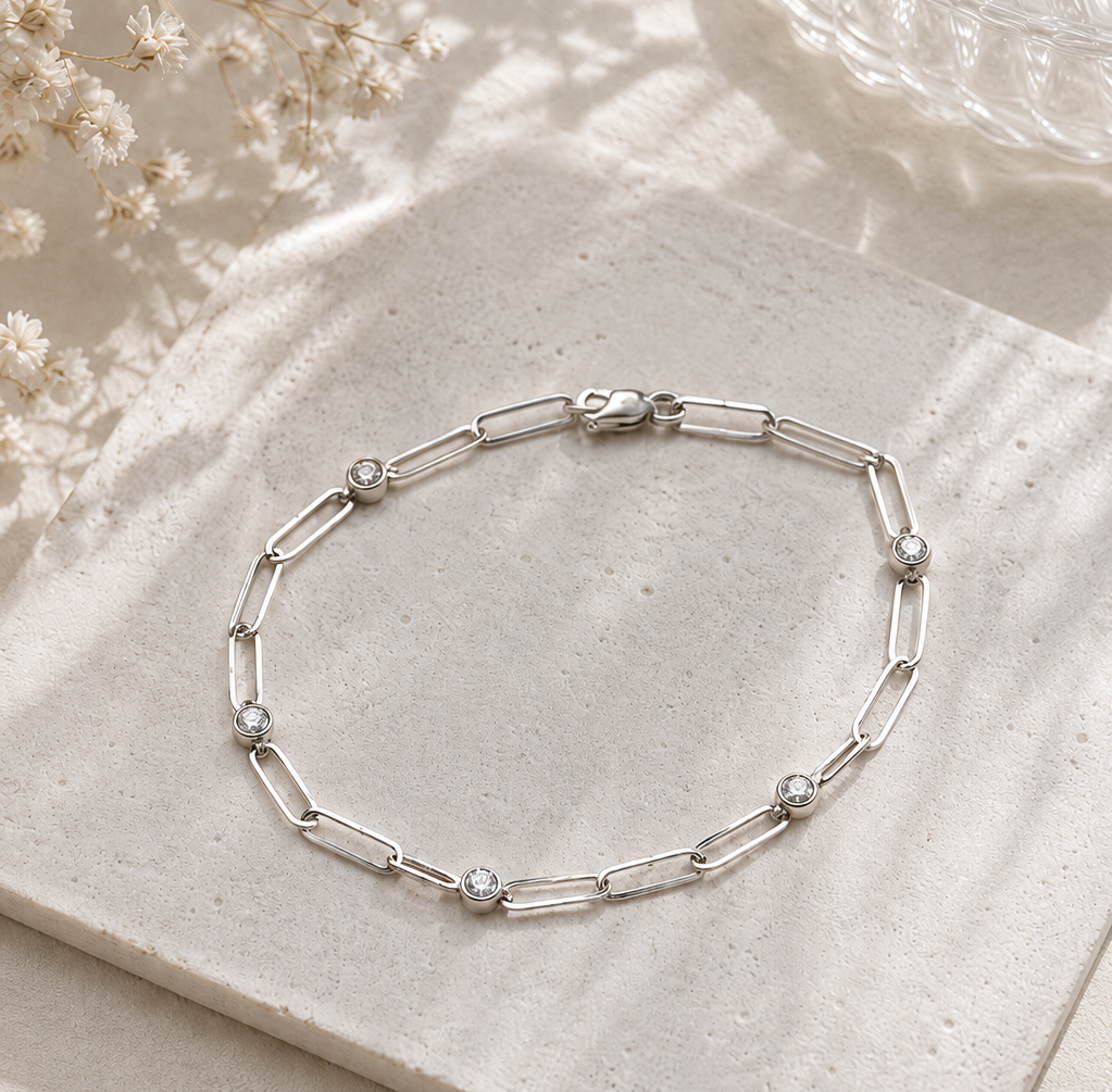 Clip y diamantes oro blanco